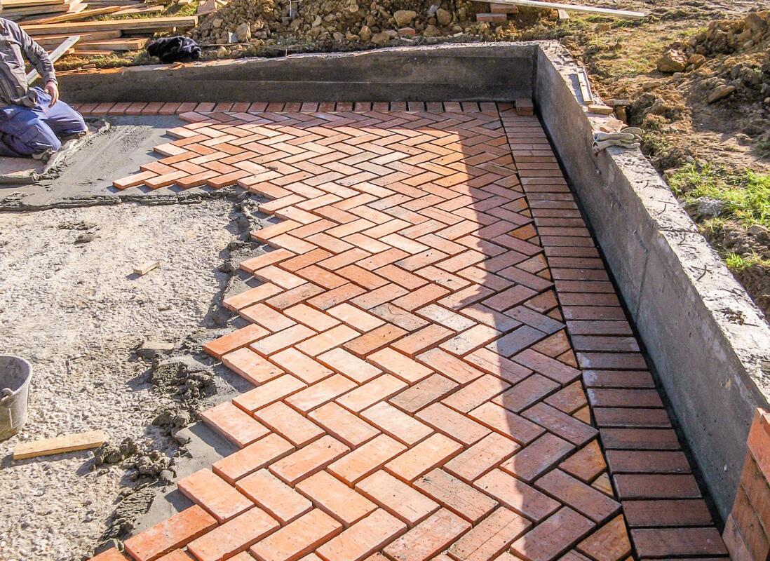 Picture of a brick patio being installed. Taken in Silver Spring MD. 